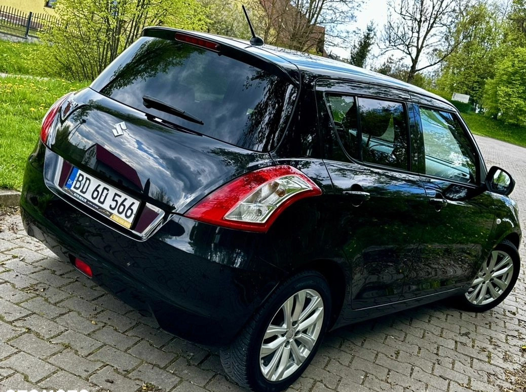 Suzuki Swift cena 27900 przebieg: 95000, rok produkcji 2014 z Bełchatów małe 22